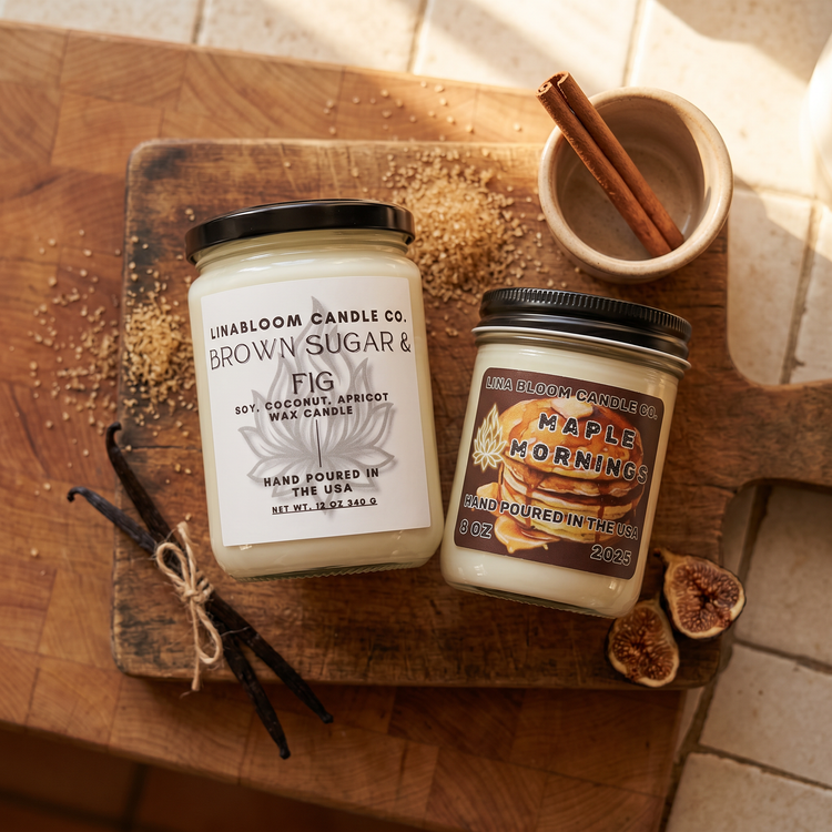 Gourmand candle collection — Brown Sugar & Fig and Maple Mornings on a cutting board with vanilla beans, brown sugar, and figs