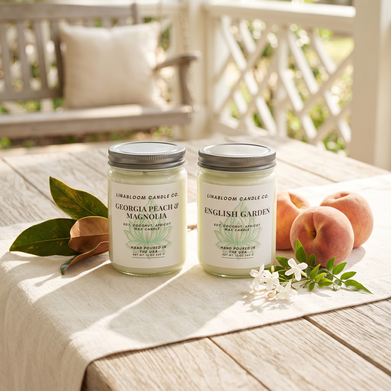 Spring and Summer candle collection — Georgia Peach Magnolia and English Garden on a Southern porch with peaches and magnolia leaves