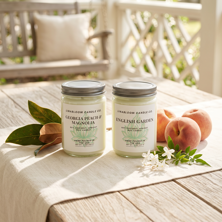 Spring and Summer candle collection — Georgia Peach Magnolia and English Garden on a Southern porch with peaches and magnolia leaves