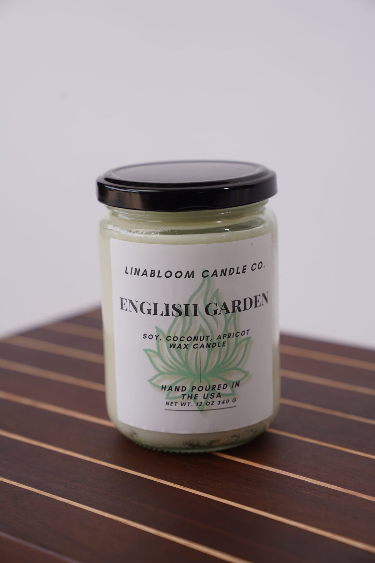English Garden 12oz hand-poured soy candle by LinaBloom — rose, jasmine, green leaves, and wet moss