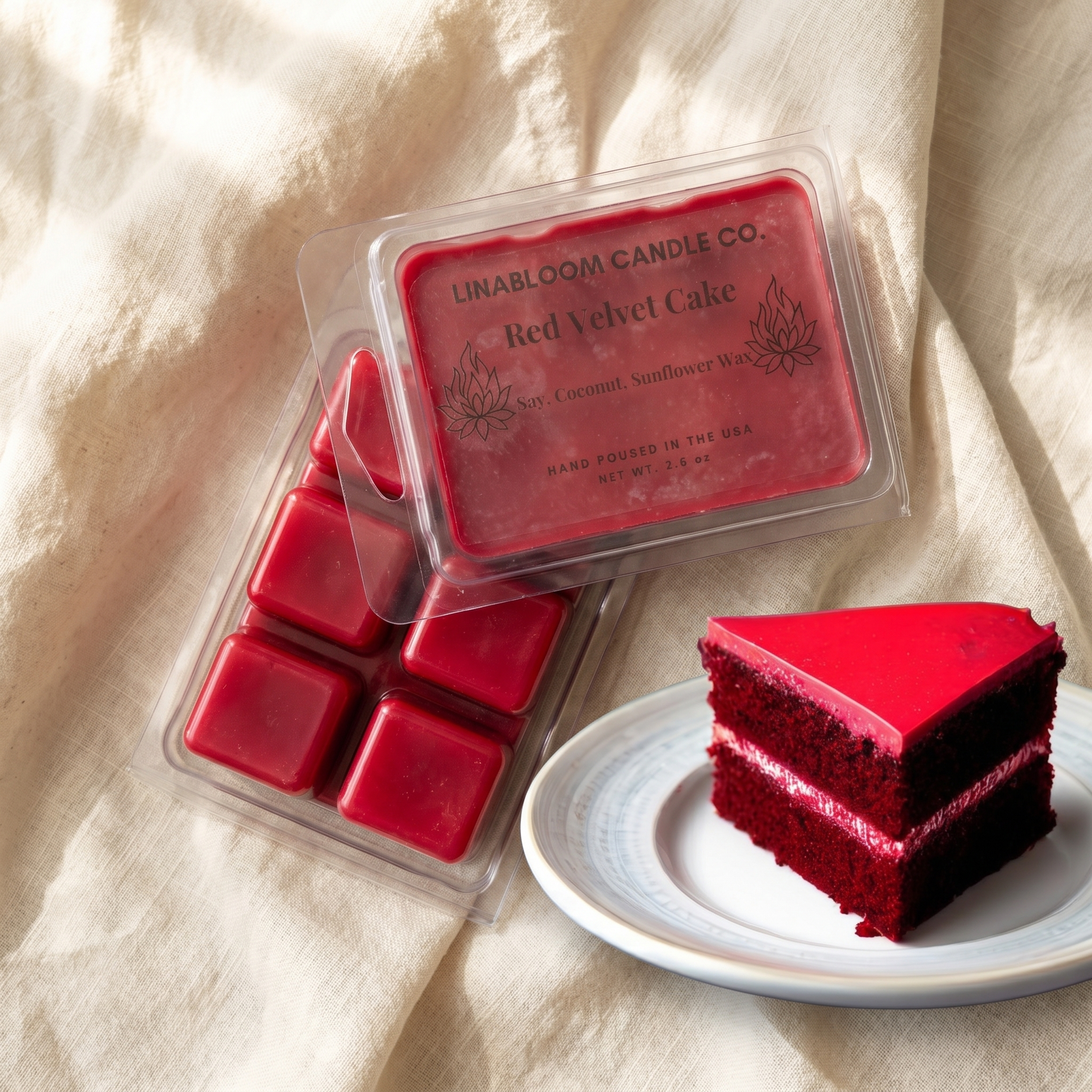 Red Velvet Cake 2.6oz LinaBloom wax melt clamshell with deep red wax cubes beside a slice of red velvet cake on cream linen