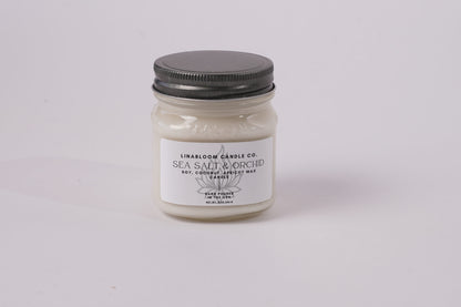 Sea Salt & Orchid 8oz hand-poured soy candle by LinaBloom — sea salt, jasmine, orchid, and green leaves