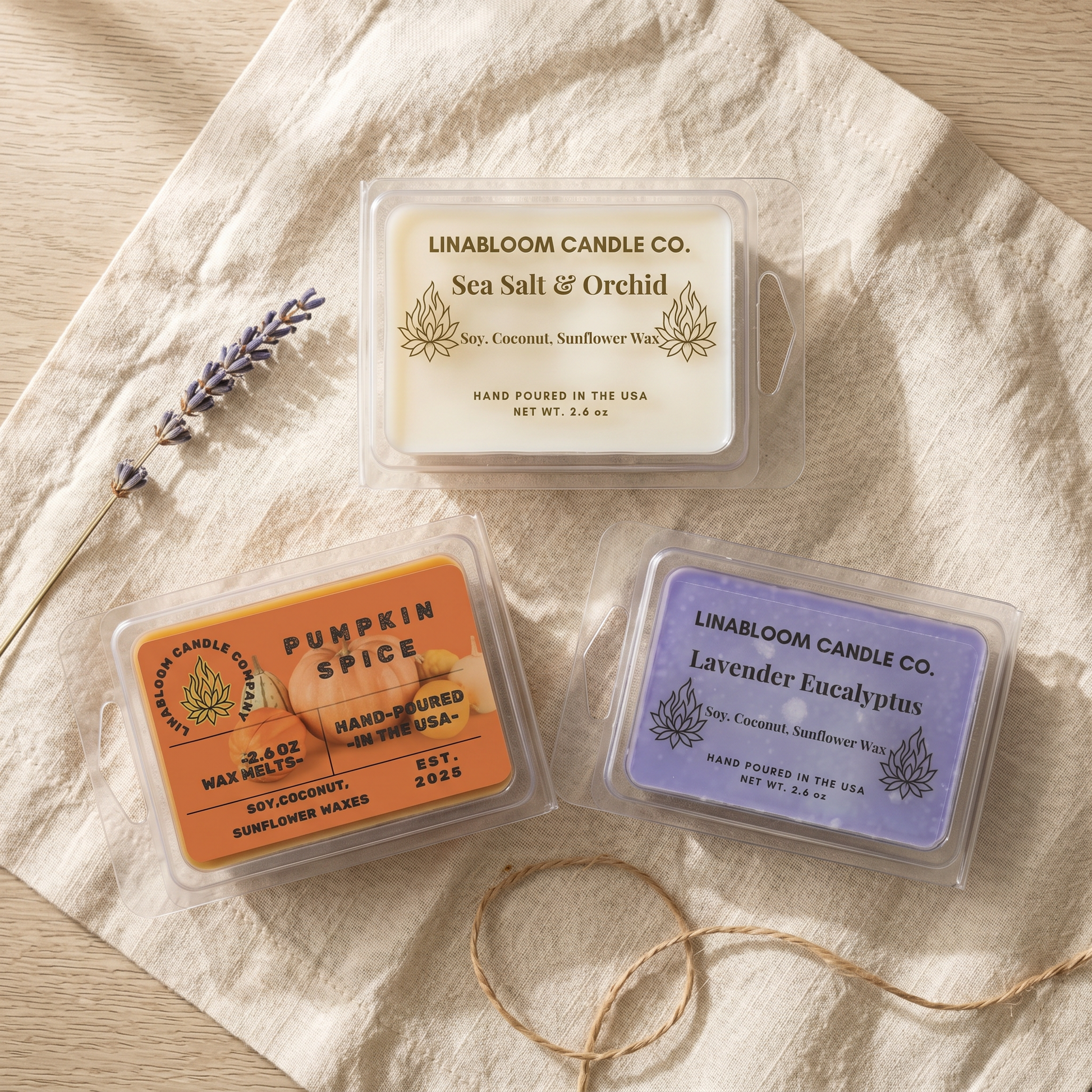 The Discovery Set — three LinaBloom Candle Co. wax melt clamshells (Sea Salt & Orchid, Pumpkin Spice, Lavender Eucalyptus) on linen with dried lavender and twine